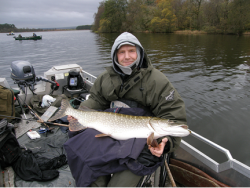 Darren Bragg, disabled angler,with a fine Pike caught from a Wheelyboat.